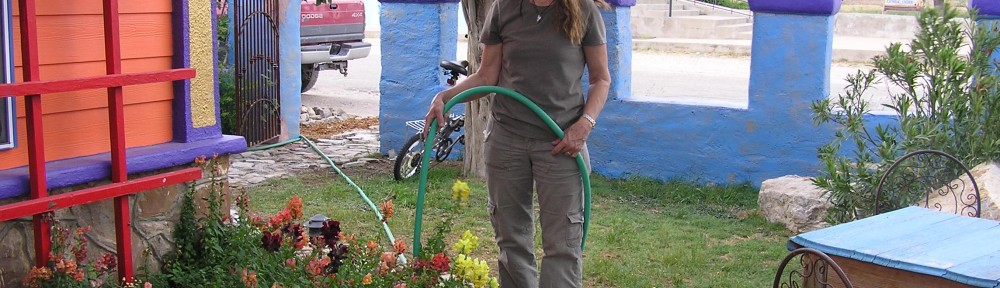 Kate watering her snapdragons